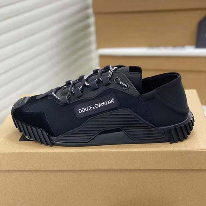 Women's black canvas slip-on sneakers