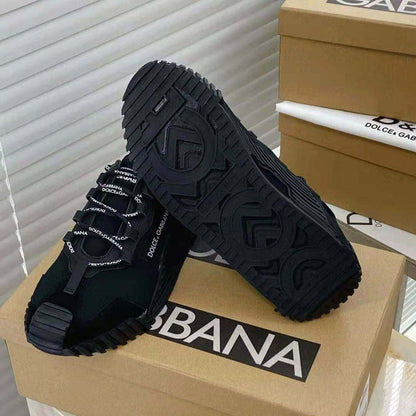 Women's black canvas slip-on sneakers