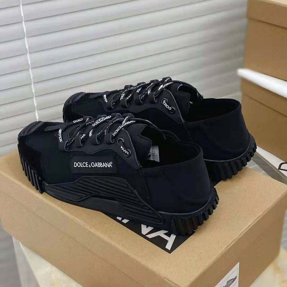 Women's black canvas slip-on sneakers